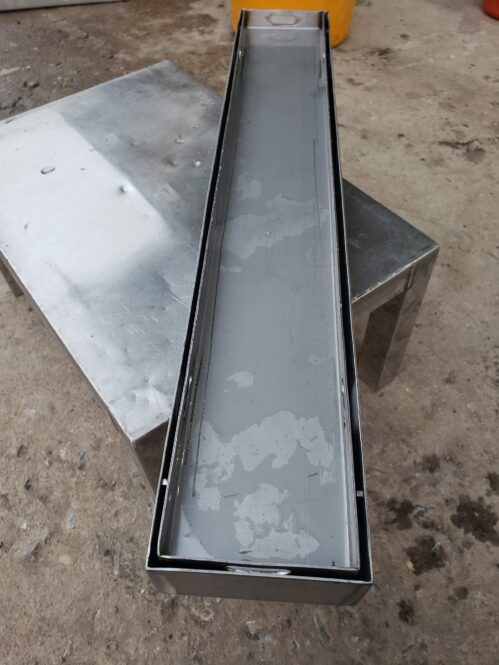 vỉ thoát sàn inox lát gạch